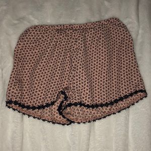 vintage havana shorts that have a navy blue trim